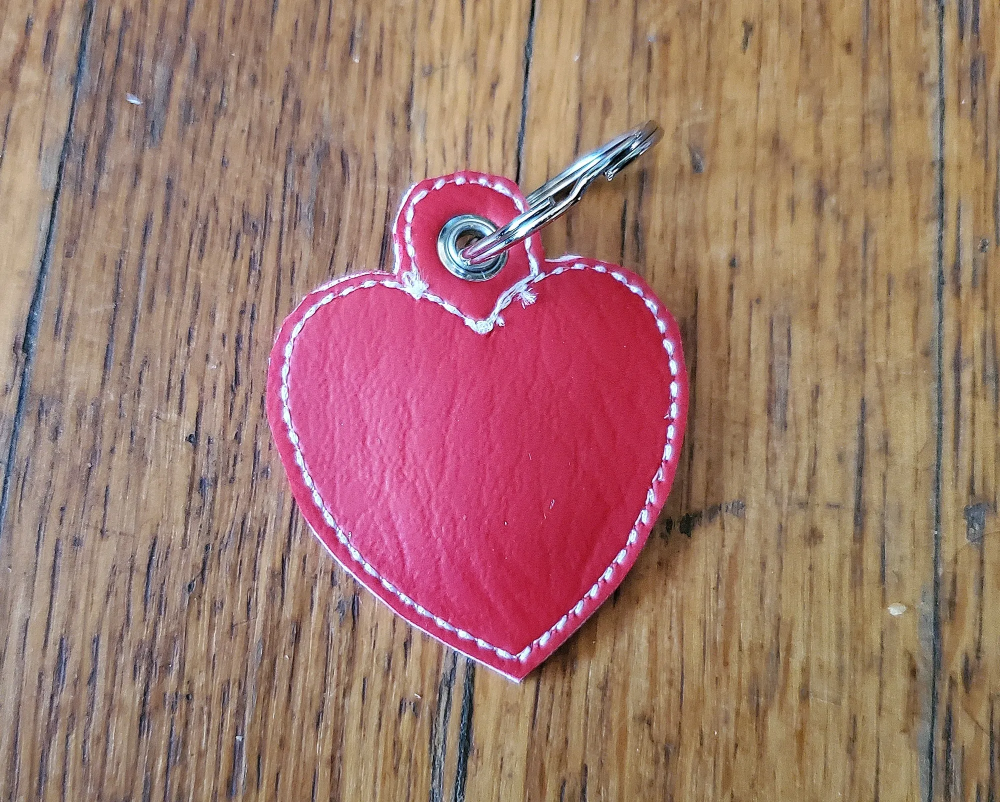 Red (white stitching) Heart Shaped Quarter Keeper - Coin Keeper